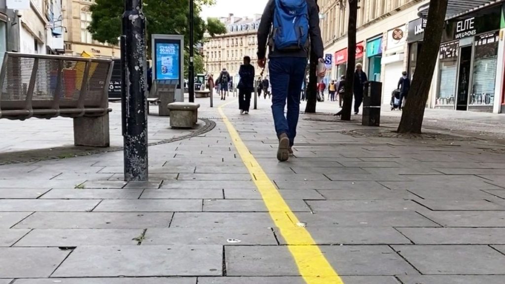 Painted lines marking walking thoroughfares on Fargate